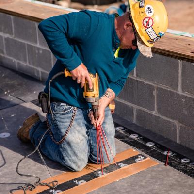 Person working on roof